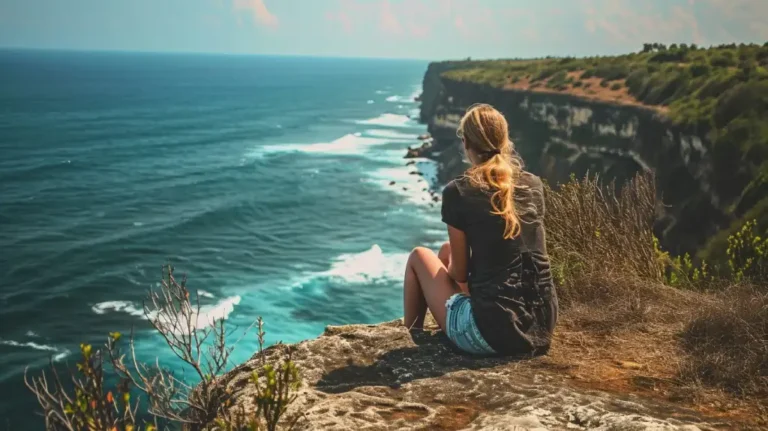 Person overlooking ocean eco-friendly lifestyle nature mindfulness.